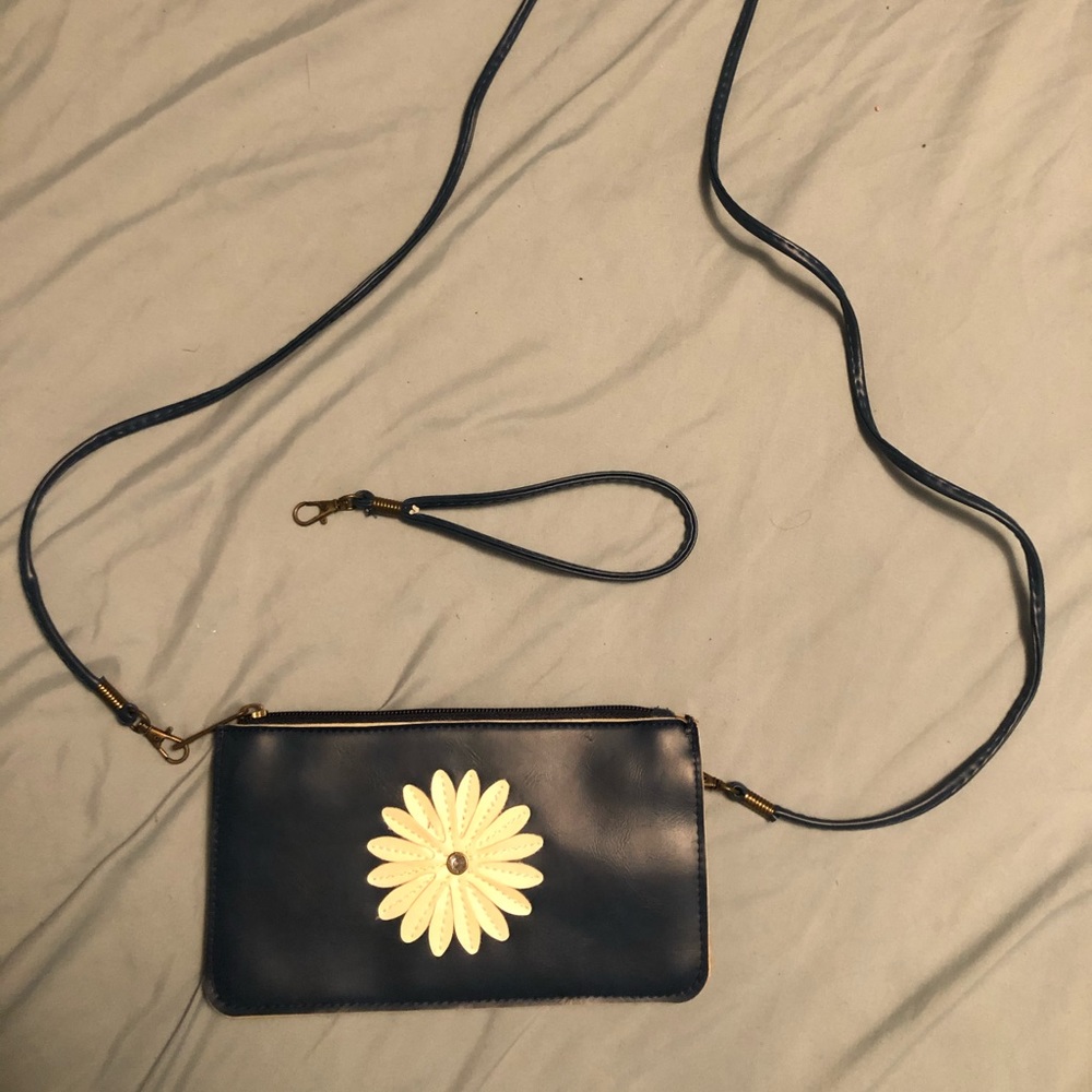 Shoulder and wristlet purse.